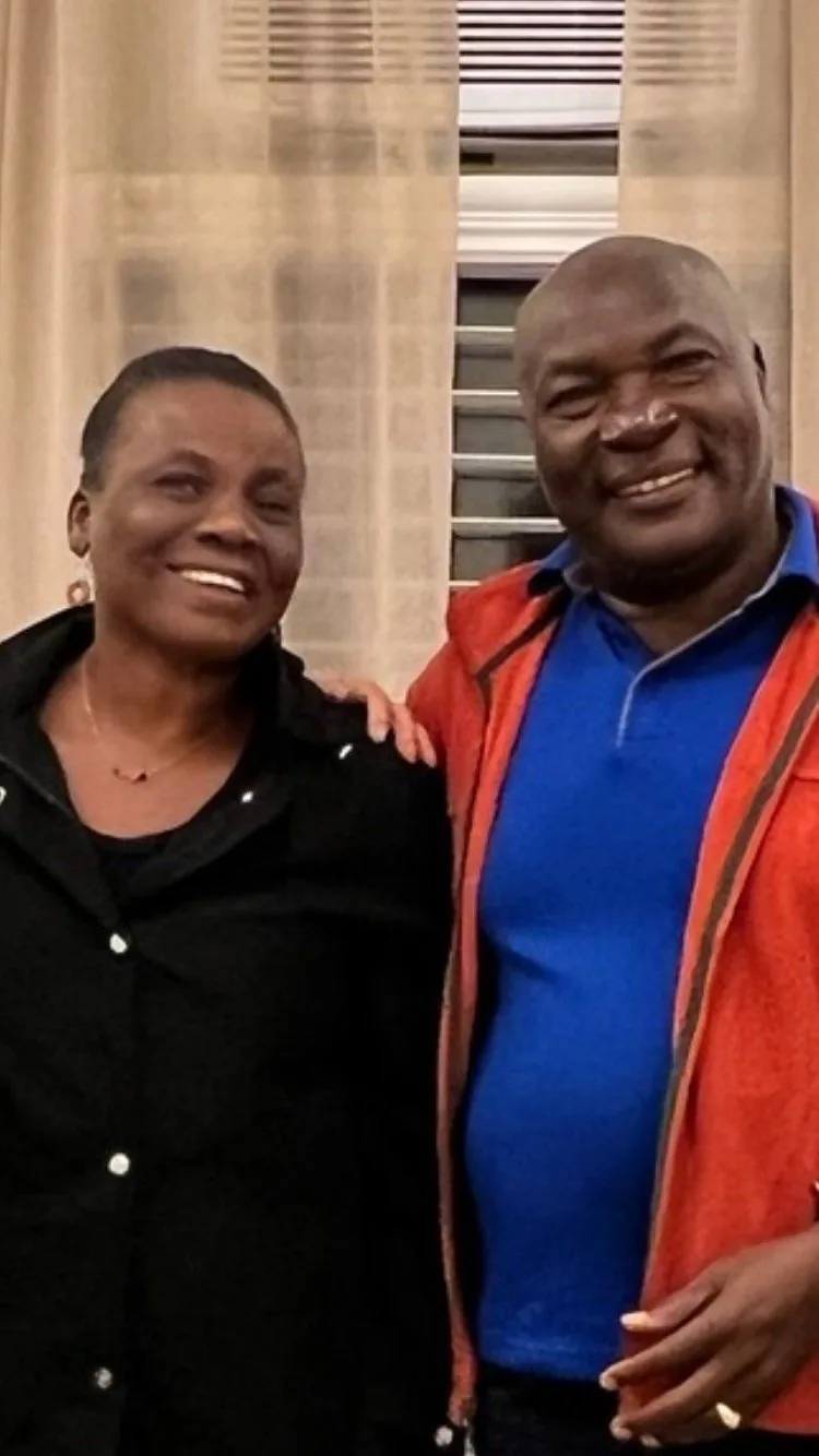 Brother Remile and Solette Casimir standing together and smiling